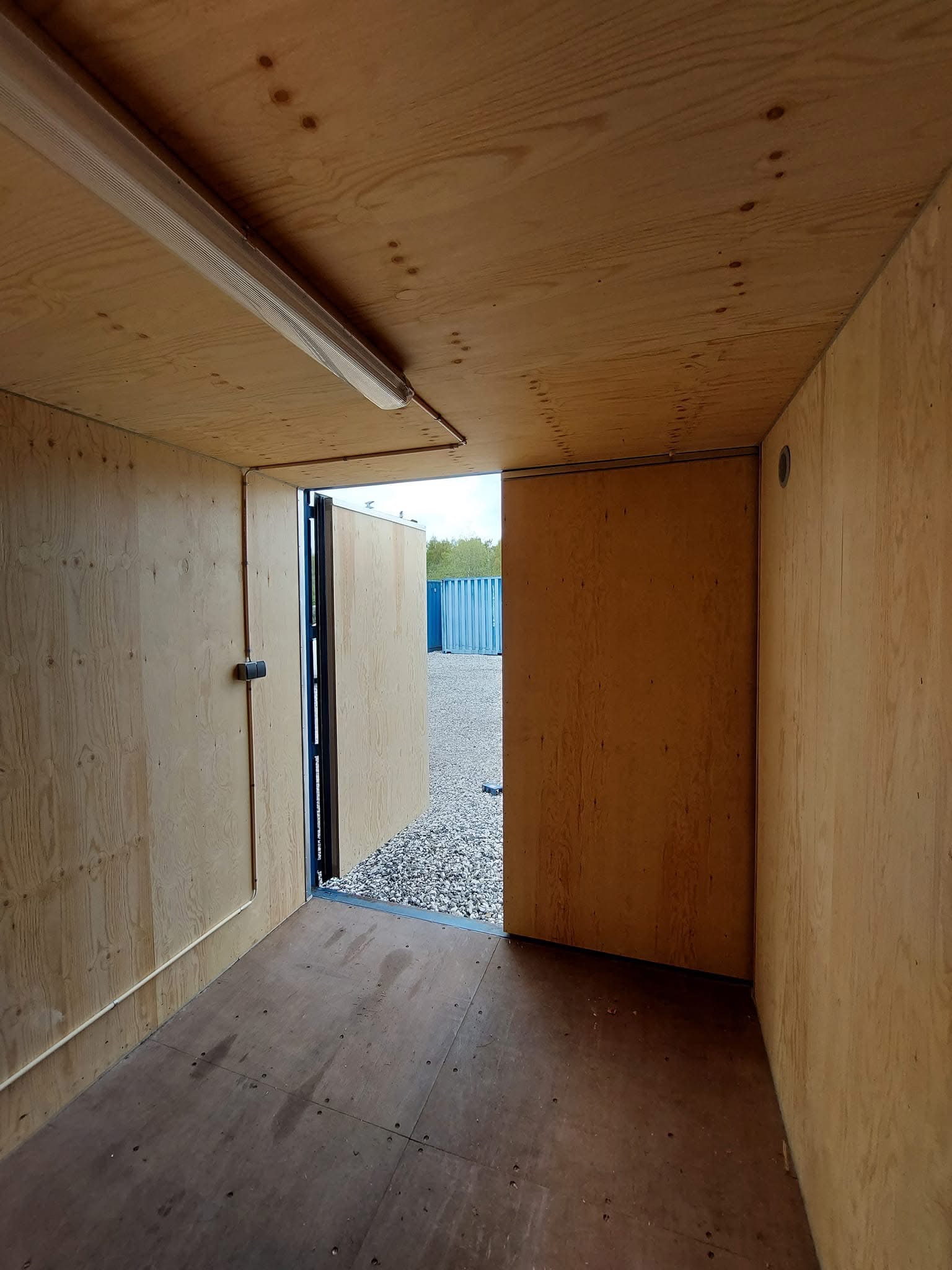 20 fots blå isolerad container indvendigt dør